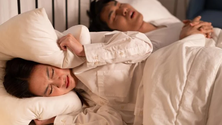 man snoring wife cant sleep