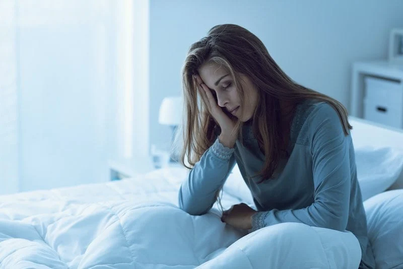 woman unable to sleep