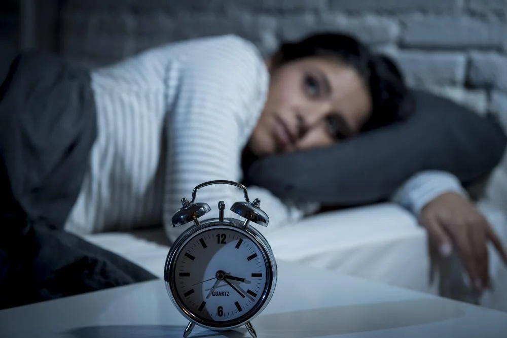woman unable to sleep