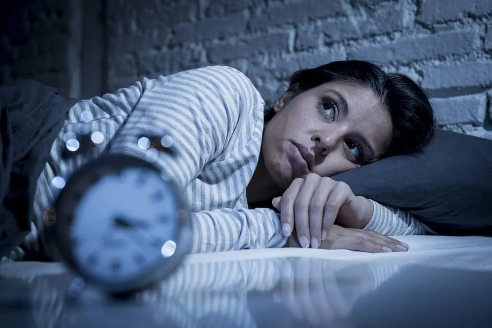 woman unable to sleep