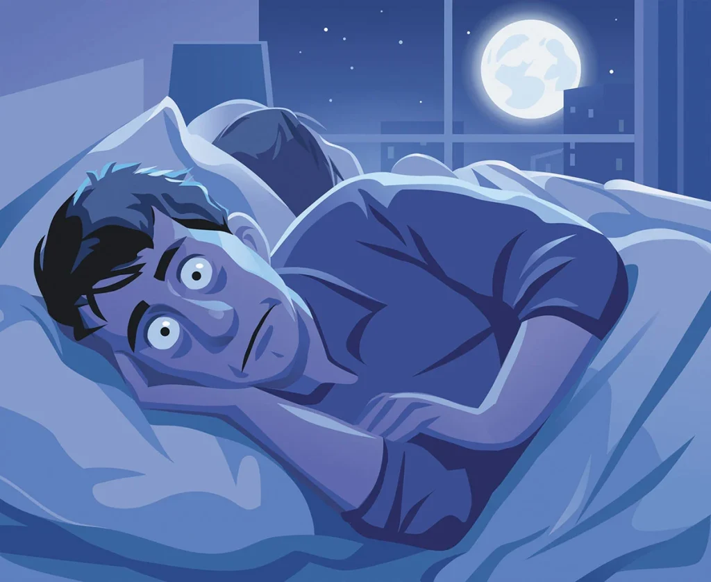 a man lies awake in bed, looking anxious, with a full moon shining through the window at night
