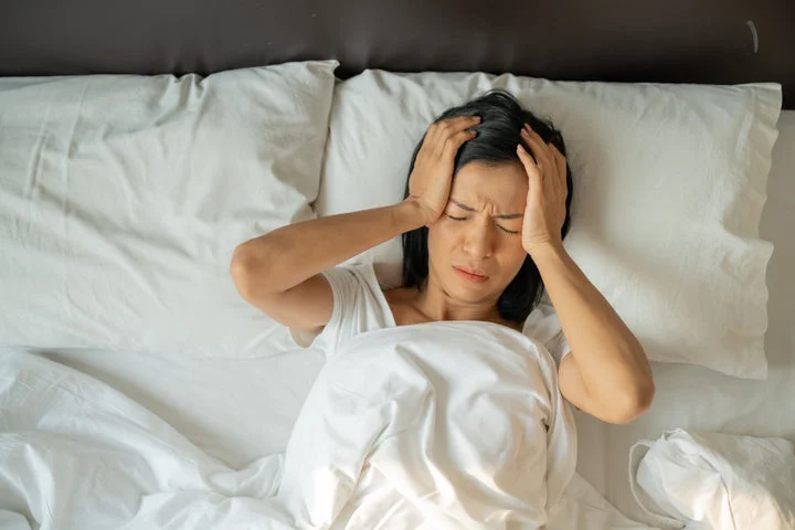 woman unable to sleep