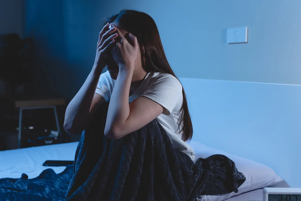 woman unable to sleep